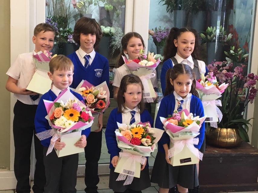 Bouquets donated by the Dutch Flower Shop.